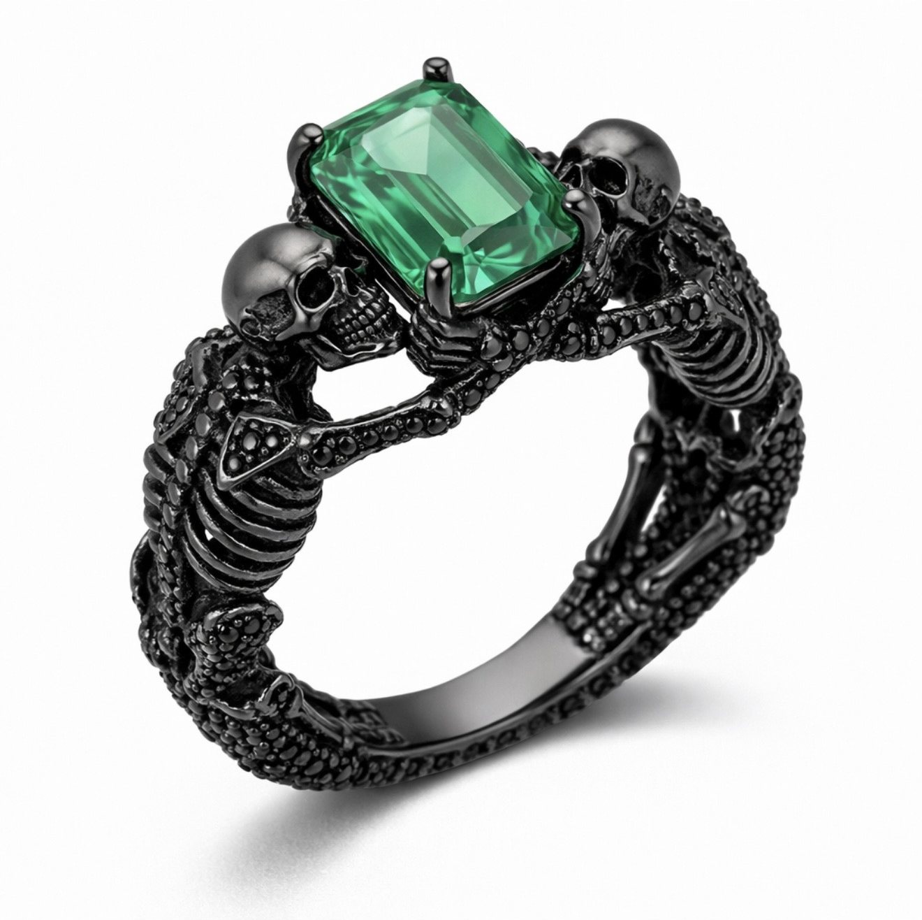 Blackened ring with emerald cut green stone
